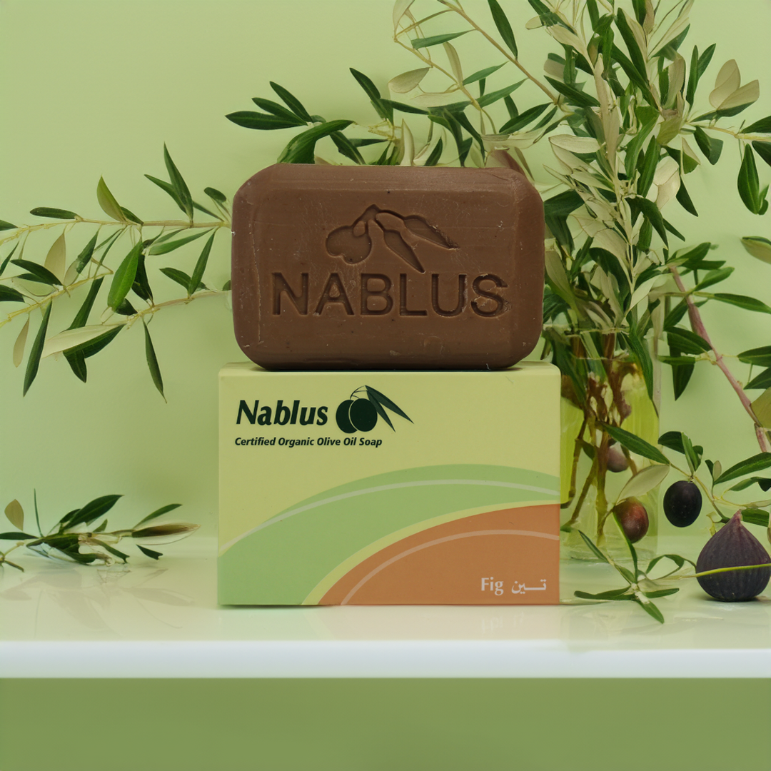 fig and olive oil soap bar stnading on its packaging reading certified organic olive oil soap