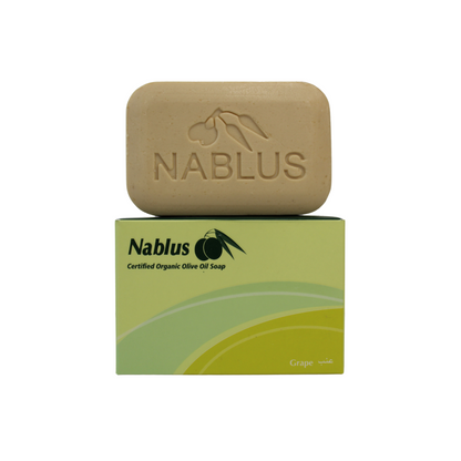 grape and olive oil soap standing on its packaging made by nablus soap company