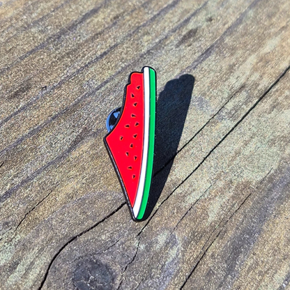 watermelon print palestine map enamel pin on wooden background 